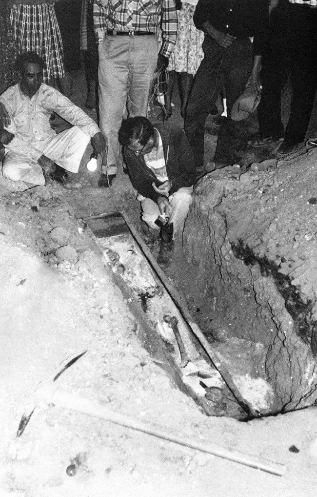 The bones of Juan Bautista de Anza, famed for leading the first Spanish colonists to northern California in 1776 and choosing the site of San Francisco, are identified by a University of California anthropologist in their unmarked grave beneath an ancient church in Mexico, March 3, 1963.