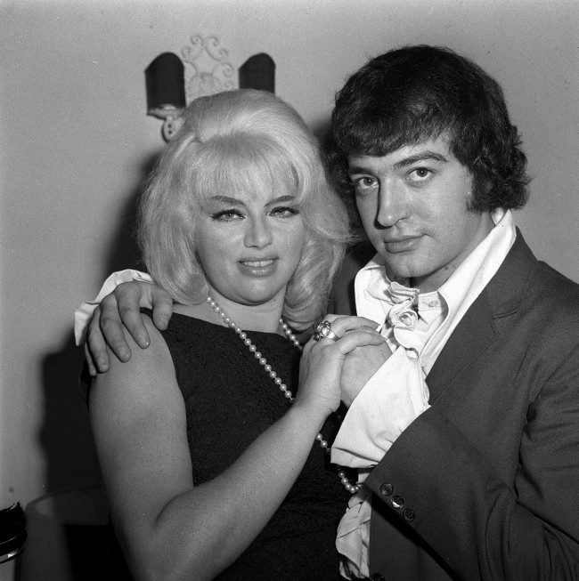 With a large ring on her engagement finger, actress DIANA DORS is pictured in London to-night (Monday) with 27 year old actor ALAN LAKE, from Stoke-on-Trent, whom she is to wed. Ref #: PA.1244660  Date: 28/10/1968