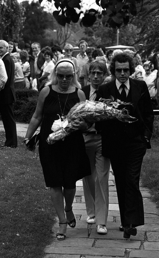 Actress Diana Dors arriving with husband Alan Lake (right) and actor Andrew Ray (centre) at Chingford Old Church today for the funeral service of Mrs Violet Kray, mother of the Kray twins, two of London's most notorious gangsters. The twins, Ronnie & Reggie, were brought from prisons where they are serving life sentences for murder for the funeral. Ref #: PA.1244667  Date: 11/08/1982