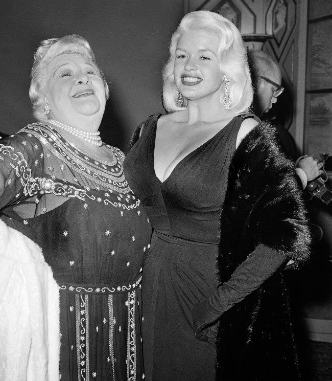Two stars of two entertainment eras, Sophie Tucker, left, and Jayne Mansfield, meet at the annual awards dinner of the Hollywood Foreign Press Association in Hollywood, March 6, 1959. They were among dozens of stars who turned out to watch presentation of awards for outstanding film performances. 