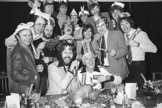A group of fifteen of radio's best-known disc jockeys eating Christmas Lunch at Broadcasting House. Back L/R Simon Bates, Mike Read, Peter Powell, Tommy Vance, Adrian Love and Richard Skinner. Middle L/R Paul Burnett, Andy Peebles, John Peel, Steve Wright, Annie Nightingale, Paul Gambaccini, and Adrian Juste. Front L/R Dave Lee Travis and Jimmy Savile. Date: 04/12/1980 