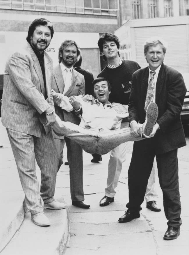 BBC Radio One Breakfast Show DJ Mike Smith (right) is joined by former presenters of the early-morning slot as the network celebrates its 20th anniversary. From left: Dave Lee Travis, Noel Edmonds, Tony Blackburn and Mike Read. Date: 30/09/1987 