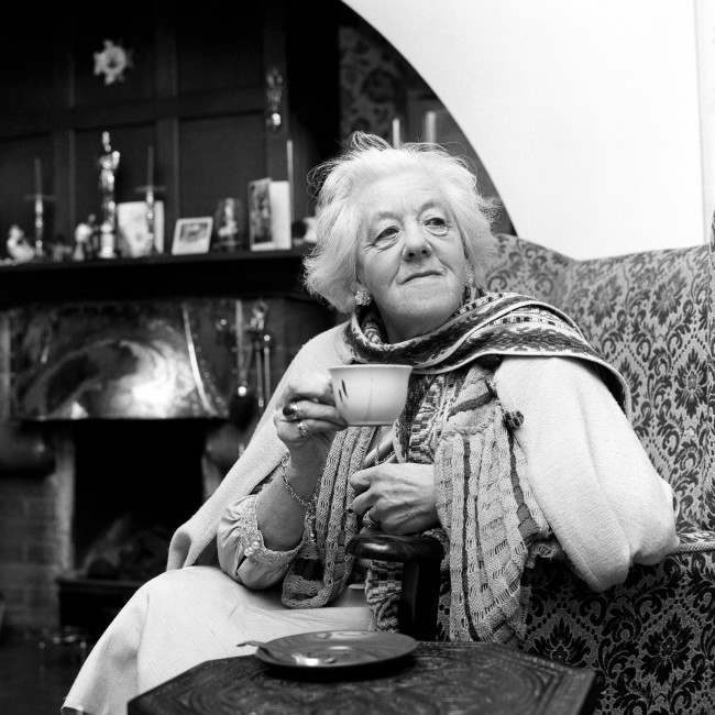 Margaret Rutherford who becomes a DBE (Dame Commander of the Order of the British Empire) in the New Year Honours, celebrates with a cup of tea at her home in Buckinghamshire. Date: 01/01/1967