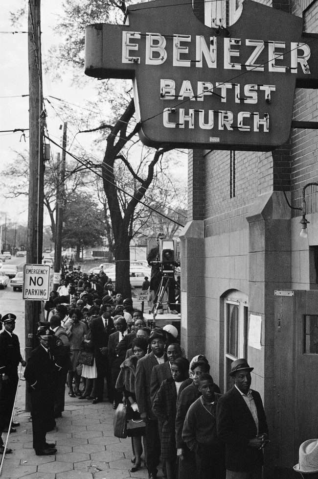  Mourners waiting to view the body of Dr. Martin Luther King Jr. line up outside the Ebenezer Baptist Church in Atlanta just after dawn April 9, 1968. Many had dept a night-long vigil. 