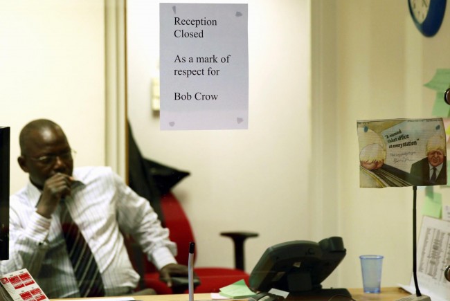 A staff member at the TSSA union office in central London, closes the reception in respect of the Rail, Maritime and Transport union (RMT) leader Bob Crow, following the announcement of his death. Picture date: Tuesday March 11, 2014. Mr Crow, who was 52, was one of the most high-profile, left-wing union leaders of his generation, sparking as much anger from passengers hit by rail and Tube strikes, as praise from his members for winning pay rises. He was constantly involved in industrial disputes and campaigns and led a walkout by London Underground workers last month in a dispute over ticket office closures. The straight-talking south Londoner was a passionate supporter of Millwall Football Club. His death caused shockwaves in the trade union movement today. 