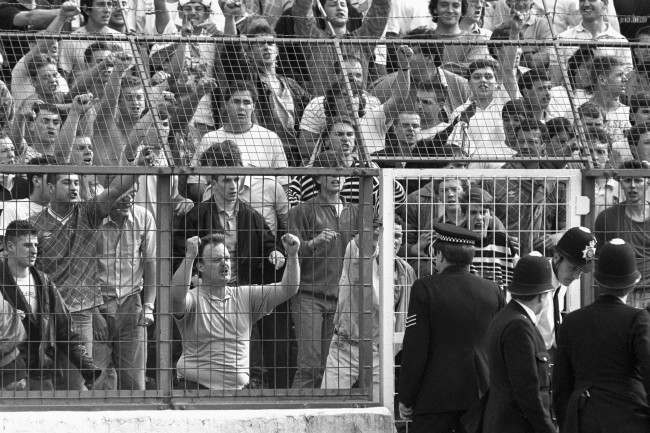 Soccer - Barclay's League Division One - Promotion/Relegation Play Offs - Final Second Leg - Chelsea v Middlesbrough - Stamford Bridge Chelsea fans hurl abuse at police officers after seeing their side relegated to Division Two Ref #: PA.2939705  Date: 28/05/1988 