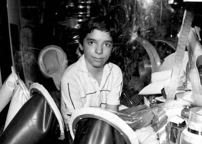 David Vetter, born with an inherited disorder, which leaves him no natural immunities against disease, is shown in this Sept. 11, 1982 photo in Texas. Now, those closest to Vetter, fear a Walt Disney Studios film about a love-struck boy who crosses the country in a bubble will mock Vetter's life. "Bubble Boy'' is scheduled to be released on Friday, Aug. 24, 2001, by Touchstone Pictures, a division of Walt Disney Co. In 1984, Vetter died from complications of an experimental bone marrow transplant, thought to be his only chance at survival outside his bubble. (AP Photo)