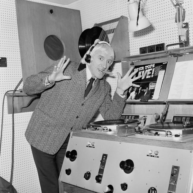 Radio One DJ Jimmy Savile, in his studio. Date: 13/01/1972