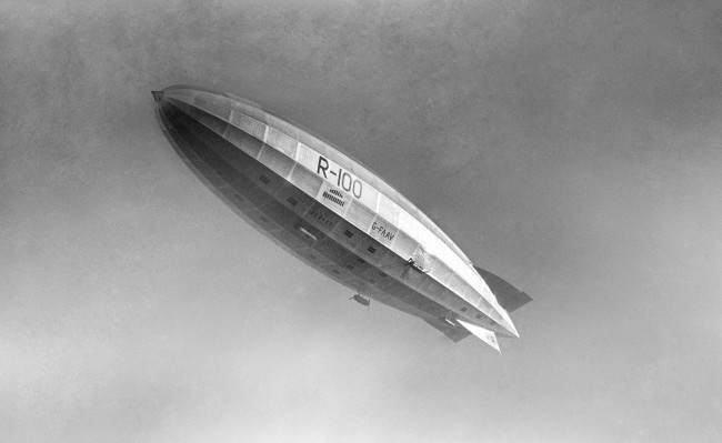 The R100 airship. Built in Howden, Yorkshire, and designed by Barnes Wallis, the design team also featured future novellist Nevil Shute Norway. Date: 12/12/1929