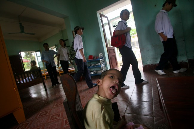 Vietnamese high school children visit a "peace village" center at a hospital in the village of Thuy An, Vietnam which cares for physically and mentally disabled children suspected to have been harmed by exposure to dioxin in the chemical defoliant Agent Orange, in this May 15, 2007, file photo.