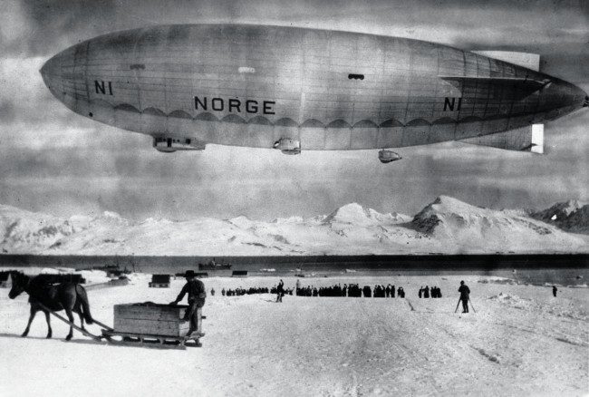 The airship Norge floats above Spitzbergen, Norway, in May 1926, before an expedition over the North Pole by Norwedian explorer Roald Amundsen. On May 11, 1926 Amundsen and his crew, including Italian Umberto Nobile who constructed and piloted ship departed in the Norge. Seventy-two hours later they landed at Teller, Alaska, becoming the first people to fly over the pole and confirming there was no land there.