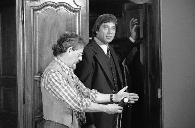 Joe Namath stands by as a technician takes a reading during the filming of commercials for "Joe Namath" clothes in New York, March 30, 1977. Namath said nothing has been settled as far as his going to the Los Angeles Rams to play footbal