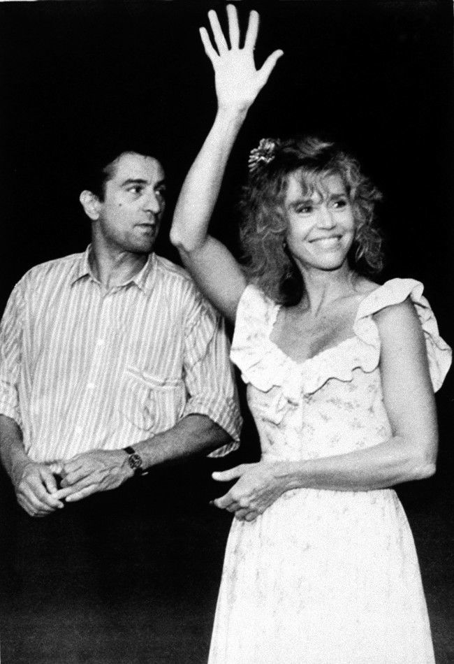 Actress Jane Fonda, waving to fans, and actor Robert De Niro arrive for the Brandie Schieb Children's Fund in Woodbury, Conn., Friday, July 29, 1988. The benefit is for children with birth defects due to Agent Orange, a toxic herbicide used by the U.S. military during the Vietnam War.