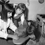 1964: Teenage Girls Iron Their Hair Before A Night Out In New York City
