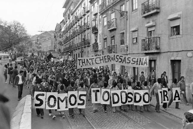 Demonstrators spelling out ÂWe are all IRAÂ protest the death of Bobby Sands at a Lisbon, Portugal on May 6, 1981 march on the British Embassy. 