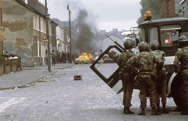 British troops (in foreground) clash with demonstrators in a Catholic-dominated area of Belfast, Northern IrelandÂs troubled capital city on May 5, 1981. Demonstrators returned to the streets in force, armed with petrol and acid bombs, following the death of Irish Republican Army hunger striker Bobby Sands.