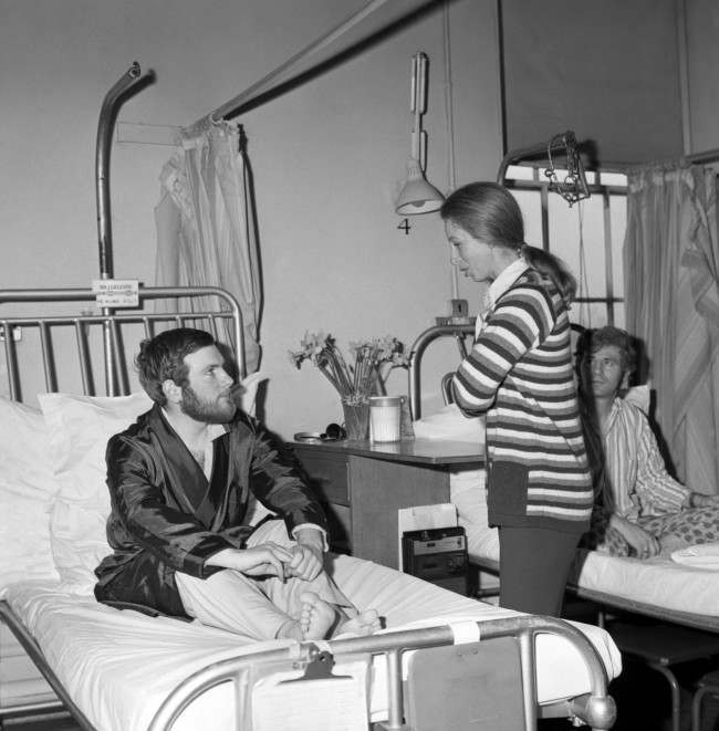 Princess Anne talks to PC Michael Hills, who was injured during Ian Ball's attempt to kidnap Princess Anne in Pall Mall. 923-Archive-pa165834-65 Ref #: PA.19319596  Date: 25/03/1974