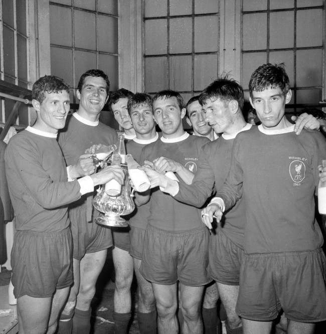 Liverpool celebrate their FA Cup Final victory in milk in the Wembley dressing room. Left to Right: Stevenson, Yeats (captain), Lawler, Hunt, Thompson, Byrne, Smith and Strong. 