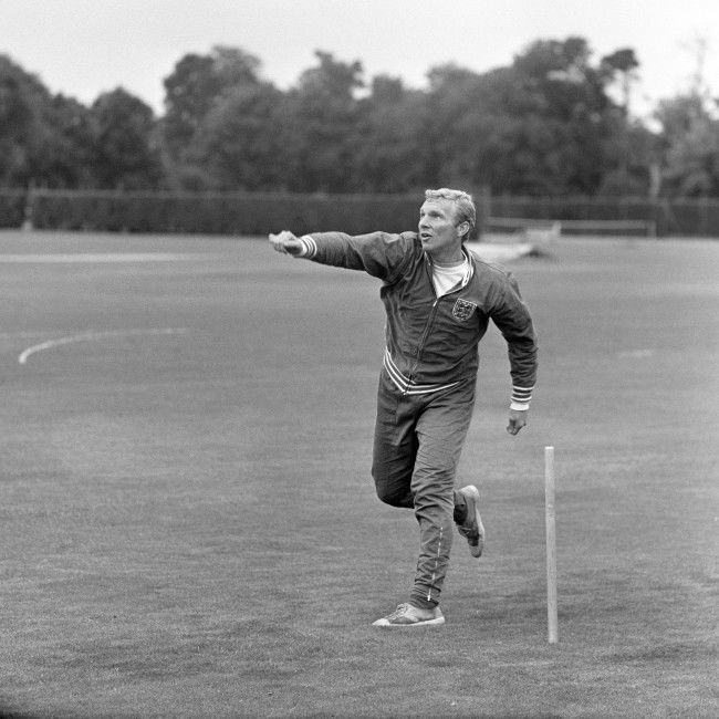 England captain Bobby Moore turns his arm over as the players relax with a game of cricket Ref #: PA.2507799  Date: 15/07/1966