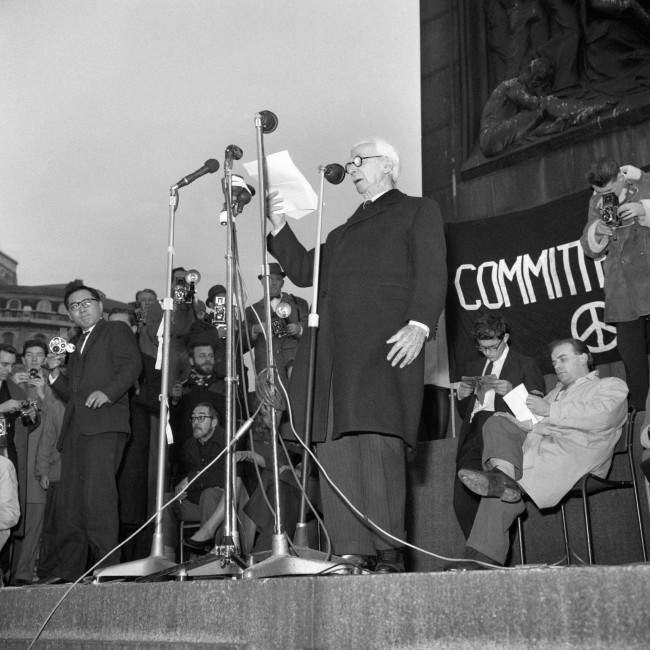 Earl Russell speaking from the plinth of Nelson's Column when he attended a meeting held by the Committee of 100, the anti-bomb organisation, in Trafalgar Square, London, to explain the Committee's aims and principles. Ref #: PA.6739950  Date: 29/10/1961 