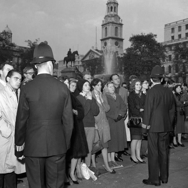 Police keep a respectful presence at the protest meeting in Trafalgar Square organised by The Committee of 100. The crowd are listening intently as one of the founders of the movement, the philosopher Earl Russell, was speaking. Ref #: PA.6739960  Date: 29/10/1961