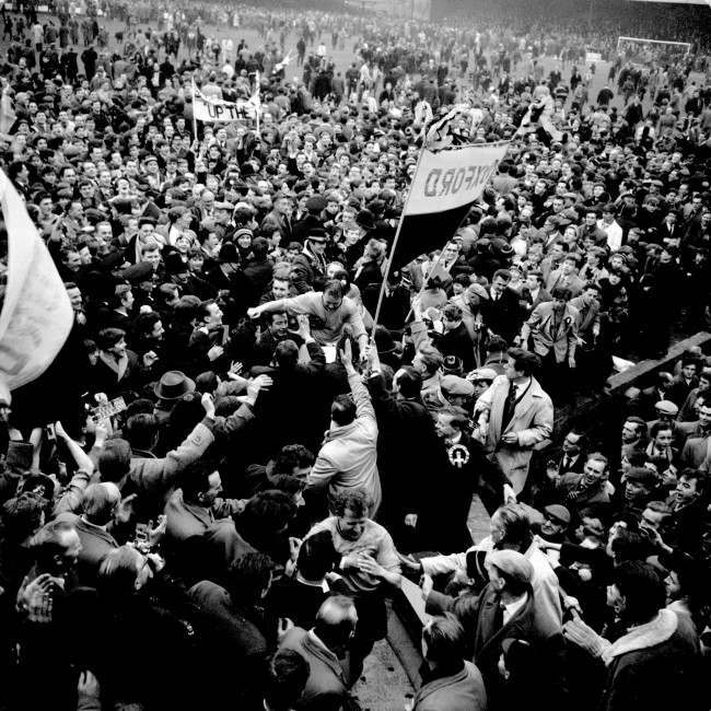  Soccer - FA Cup - Fifth Round - Oxford United v Blackburn Rovers Oxford United captain Ron Atkinson (c) is carried off by euphoric fans after his team beat First Division Blackburn Rovers 3-1 Date: 15/02/1964