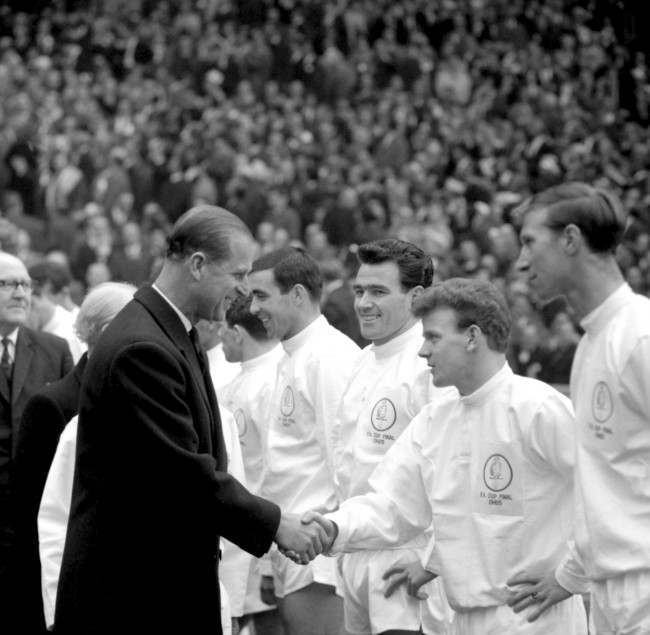 HRH The Duke of Edinburgh shakes hands with Leeds United's Billy Bremner (second r) before the match as Leeds' Jack Charlton (r) and Jim Storrie (third r) look on