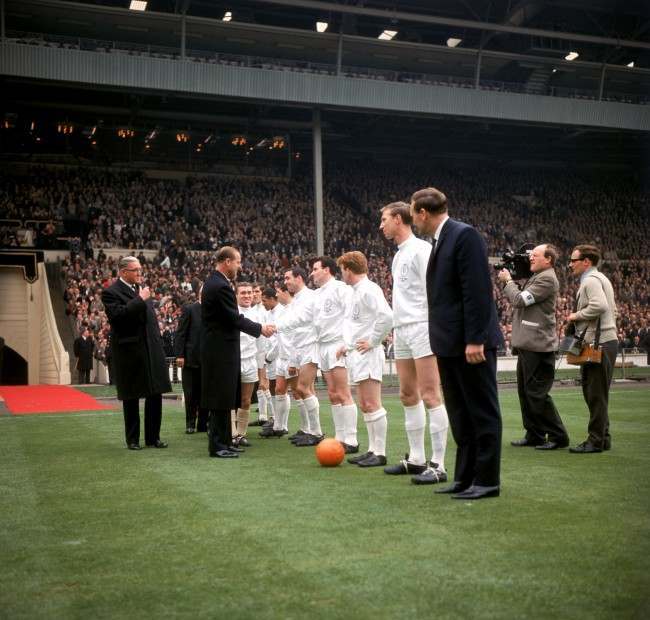 HRH The Duke of Edinburgh (second l) shakes hands with Leeds United's Jim Storrie (fourth r) as he is introduced to the players by Leeds captain Bobby Collins (third l). Awaiting their turn are Leeds United's Billy Bremner (third r), Jack Charlton (second r) and manager Don Revie (r)