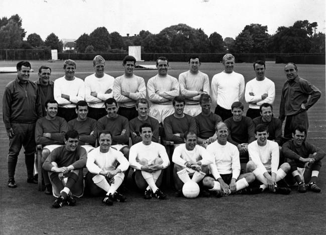 Members of the England World Cup soccer team pose at the training ground at Roehampton, England, June 22, 1966. From left to right, back row: Harold Shepherdson, Les Cocker, Roger Hunt, Ron Flowers, Peter Bonetti, Ron Springett, Gordon Banks, Bobby Moore, Jimmy Greaves and manager Alf Ramsey. Middle row: Jimmy Armfield, Ian Callaghan, Gerry Byrne, George Eastham, Geoff Hurst, Jackie Charlton, Alan Ball and Nobby Stiles. Front row: Norman Hunter, George Cohen, Terry Payne, Ray Wilson, Bobby Charlton, Martin Peters and John Connelly. (AP Photo) Ref #: PA.8306627  Date: 22/06/1966