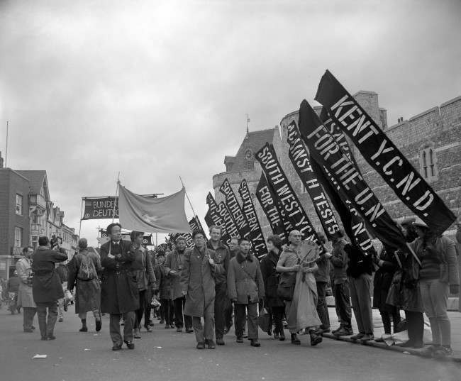 A group of campaign marchers from Hiroshima, Japan, pass Windsor Castle. Ref #: PA.8520232  Date: 14/04/1963