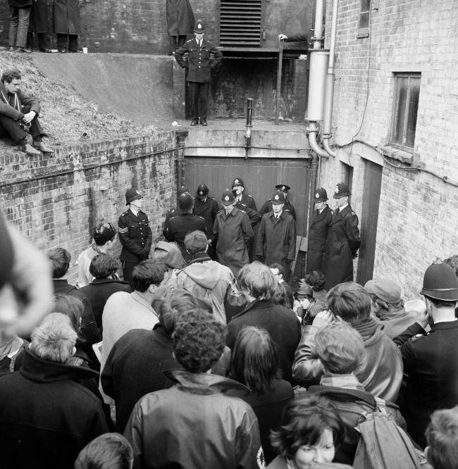 A double rank of policemen guards an entrance to a bunker type building in Berkshire, where nuclear disarmament demonstrators attempted to stage a protest. Ref #: PA.8520361  Date: 15/04/1963