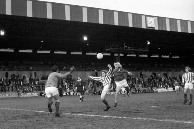 Everton's Alan Whittle (r) beats Stoke City's goalkeeper Gordon Banks (l) to score Everton's first goal of the night. Stoke City went on to win the match 3-2 in front of just over 5,000 fans.