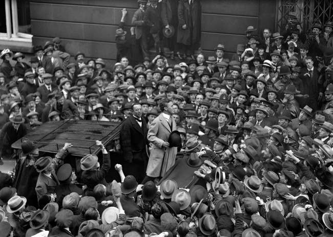 British star of the silent screen,Charlie Chaplin, addressing the crowd outside the Ritz Hotel, where he is staying. PA/PA Archive/Press Association Images