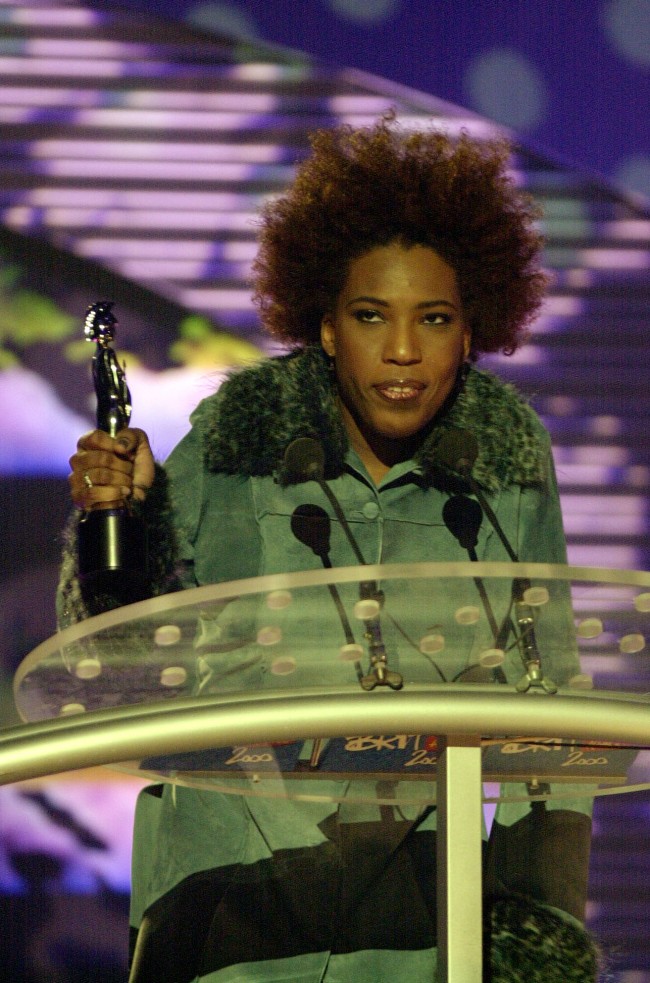 American R&B singer Macy Gray receiving her award for Best International Newcomer, during the Brit Awards 2000 ceremony, held at Earls Court in west London. Date: 03/03/2000