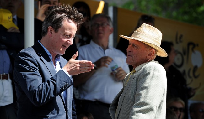 Prime Minister David Cameron talks with sir Geoff Boycott before stage one of the Tour de France in Harrogate, Yorkshire.