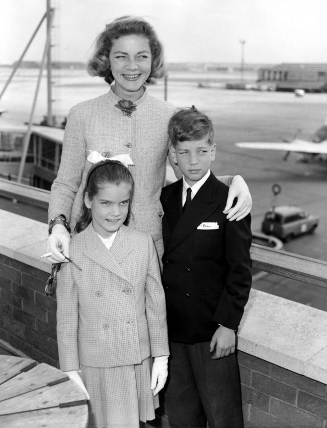 American actress Lauren Bacall with her two children Leslie and Stephen as they left London Airport for a five week holiday in Biarritz. Date: 14/07/1959