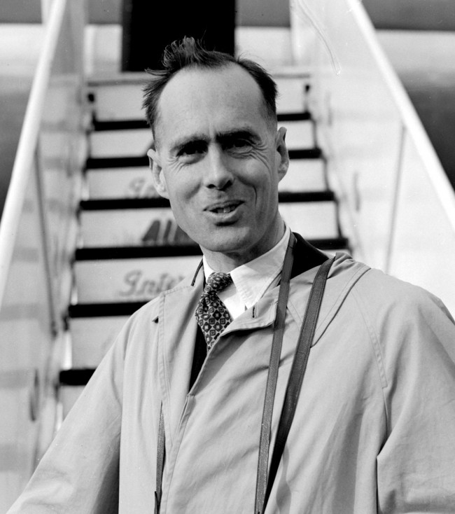 Group-Captain Leonard Cheshire, VC, triple DSO and DFC, pictured as he boarded an Air India liner at London Airport. He is going to launch his new home for the chronic sick recently established in the hills at Kodaikanal, Southern India. He will be seeing it for the first time. Ref #: PA.1631068  Date: 02/11/1955