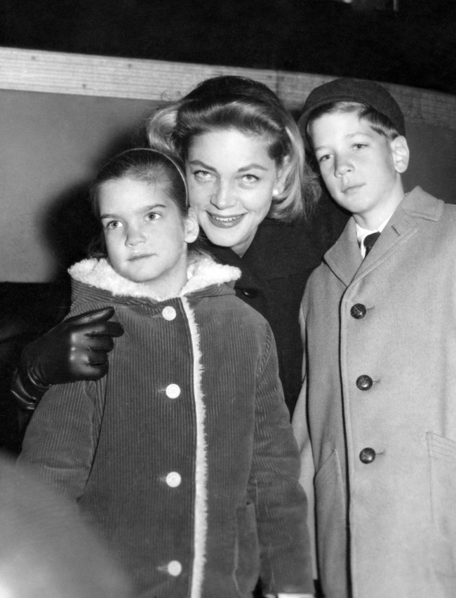 Hollywood star Lauren Bacall arrives at London Airport with her children Steve, 10, and Lesley, 6. She is due to film North West Frontier at Pinewood Studios. Date: 10/01/1959