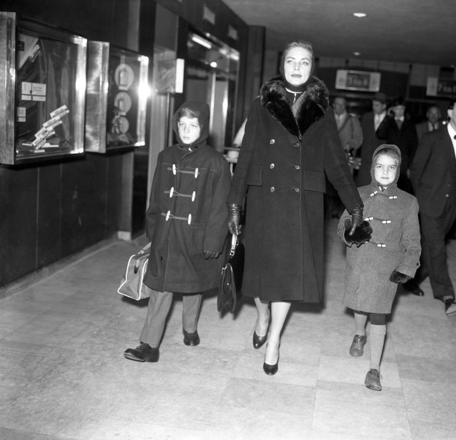 Hollywood star Lauren Bacall and her children Steve, 10, and Lesley, 6, as they left London Airport for a skiing holiday in Zurich. Date: 23/01/1959 