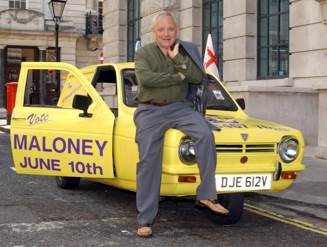 Boxing promoter Frank Maloney arrives in a three-wheel van at The Sports Cafe in London's Haymarket. Maloney is is the UKIP candidate for London Mayor.  Ref #: PA.1966032  Date: 07/06/2004 