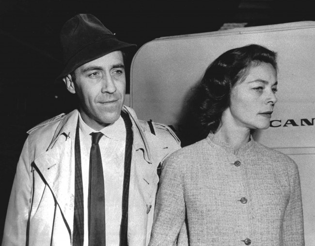 Jason Robards and Lauren Bacall are shown at New York's Idlewilde Airport in a May 8, 1961, photo. (AP Photo)