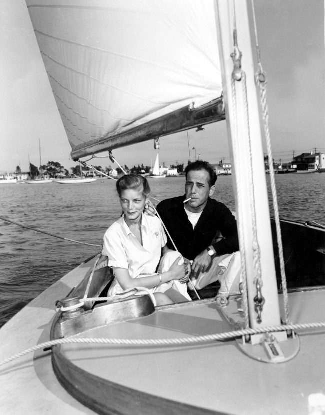 Actor Humphrey Bogart and his wife, actress Lauren Bacall, are shown on his 28-foot sailboat at Balboa Bay, Ca., on June 4, 1945. (AP Photo)