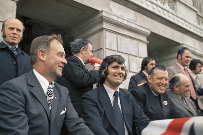 L-R: William Craig; Glenn Barr; the Reverend Ian Paisley, leader of the Democratic Unionist Party; and Harry West of Ulster Unionist Party on the platform during a meeting of Northern Ireland Protestant leaders in June 1974. Glenn Barr, chairman of the meeting, was leader of Ulster workerÂs council that called the 16 day strike. The rally was in support of the extreme protestant factionÂs stand against the power-sharing agreement worked out by an all-party committee at Sunningdale. The Ulster workers strike had earlier forced the governing Northern Ireland Assembly to abandon its rule. (AP Photo/Robert Dear) Ref #: PA.11655881  Date: 01/06/1974 