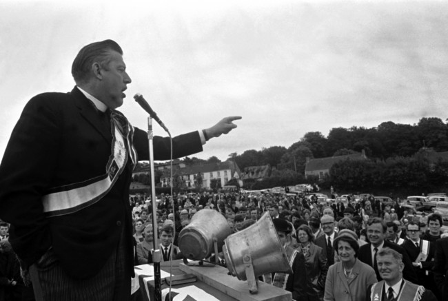 Protestant leader the Reverand Ian Paisley addresses a meeting in a field at Crossgar, near Belfast, Northern Ireland on Sept. 14, 1969, on his return to Ireland from a visit to the United States. (AP Photo/Royle)