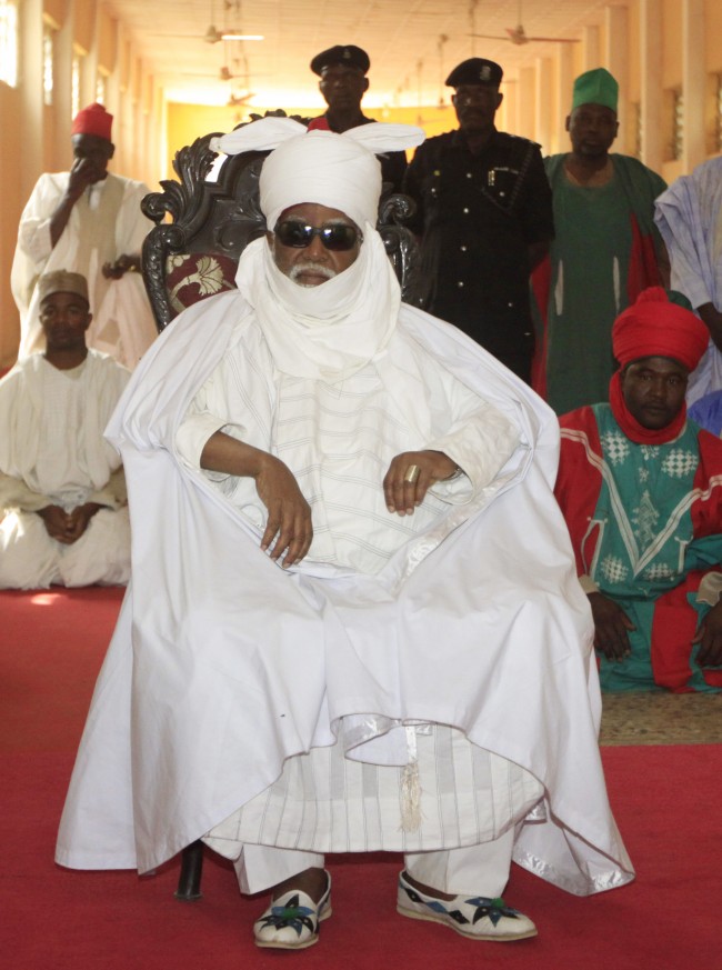 Emir of Kano, Ado Bayaro, is seen at his palace in Kano, Nigeria, Monday, Jan. 23, 2012. The emir of Kano and the state's top politician offered prayers Monday for the more than 150 people who were killed in a coordinated series of attacks on Friday by the radical Islamist sect called Boko Haram which means "Western education is sacrilege" in the Hausa language of Nigeria's north.(AP Photo/Sunday Alamba)