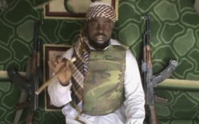 This image taken from a video posted by Boko Haram sympathisers shows the leader of the radical Islamist sect Imam Abubakar Shekau, made available Wednesday Jan. 10, 2012. The video of Imam Abubakar Shekau cements his leadership in the sect known as Boko Haram. Analysts and diplomats say the sect has fractured over time, with a splinter group responsible for the majority of the assassinations and bombings carried out in it's name.