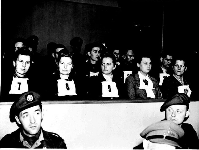 1945: THE BELSEN TRIALS. The accused women guards in the dock at the opening of the Belsen concentration camp war crimes trials at Luneberg, Germany. (l-r) Elizabeth Volkenrath, Herta Ehlert, Irma Greese, Ilse Litre and Hilda Lobauer. Belsen was liberated on 15th April 1945.