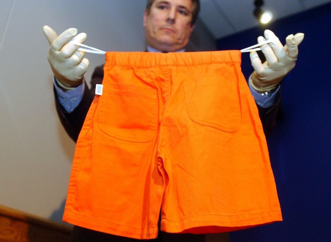 Exhibits Officer DC Mark Ham holds up a pair of children's shorts during a press conference at New Scotland Yard in central London. Police believe the shorts, which were found in the river Thames, may be connected to the murder of a young boy. * ... whose torso was found in the Thames near London Bridge. A world expert in African ritualistic murder was travelling to Britain to join the hunt for the killer of a boy whose torso was found in a river. Detectives hope forensic pathologist Dr Hendrik Scholtz will be able to shed new light on the death of the five-year-old, whose severed body was discovered floating in the Thames. Officers believe the boy could be the first person in the UK to die in a "muti killing of a kind known to have been practised in South Africa". The killings are done by witch doctors who use the victim's body parts for black magic potions. Dr Scholtz, from the Gauteng health department in South Africa, was heading to London ahead of a second post-mortem, which he will carry out. 02/07/03 : Police have arrested a 37-year old Nigerian man in Dublin in connection with the murder of the unidentified youngster who has been named Adam. Detectives fear the youngster, believed to have been between four and seven, was brought to London and killed as a human sacrifice.  Ref #: PA.1527996  Date: 25/01/2002 