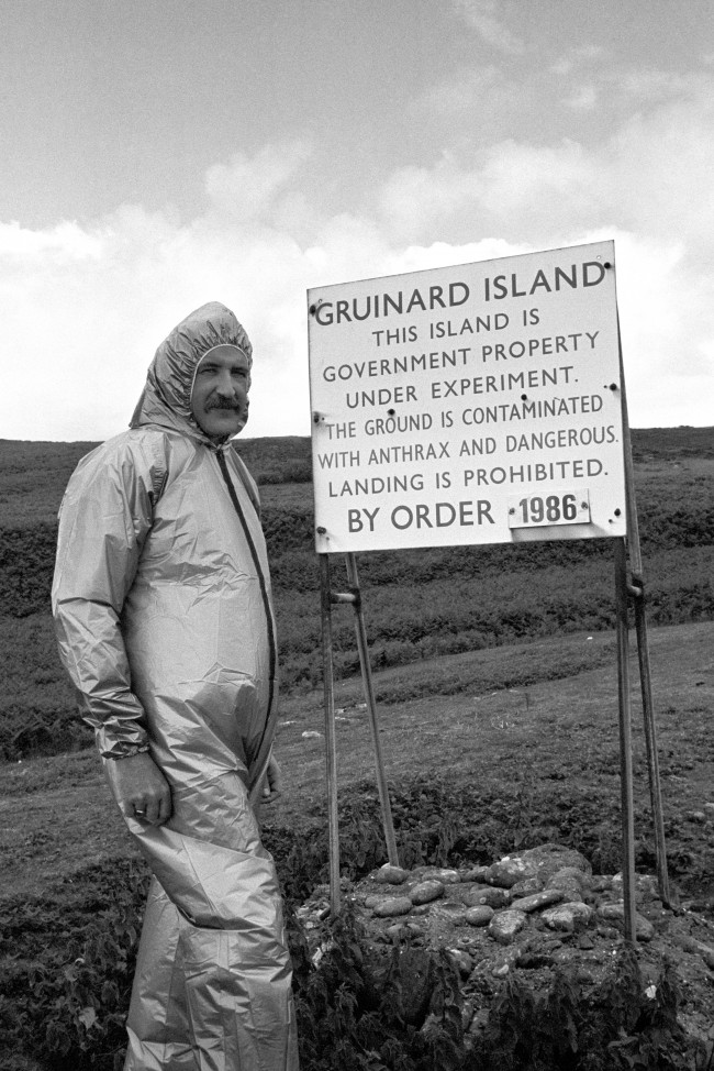 Malcolm Broster of MOD Chemical Defence Establishment at Porton Down, alongside one of the warning signs on the Gruinard Island, which has been sealed-off from the public for almost 45 years.Work has now commenced for the decontamination of the island, which was used for 13 anthrax trials in 1942 and 1943 Ref #: PA.7356756  Date: 09/07/1986 