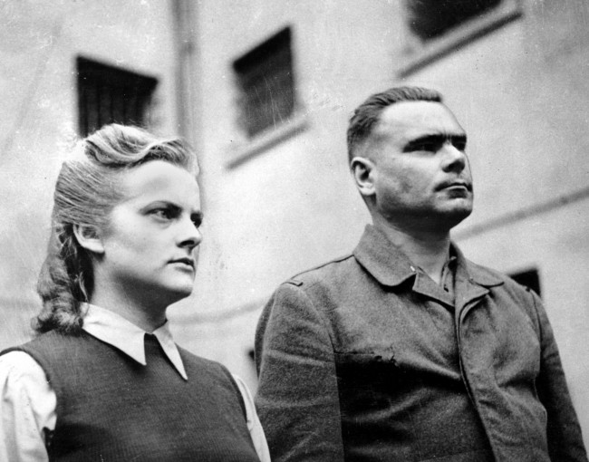 Irma Grese, left, SS supervisor at the Nazi concentration camp Bergen-Belsen, and the camp's SS commandant Josef Kramer are seen in April 1945. After British troops liberated the camp on April 15, 1945, they were tried for war crimes and hanged in the prison at Hameln. (AP Photo)